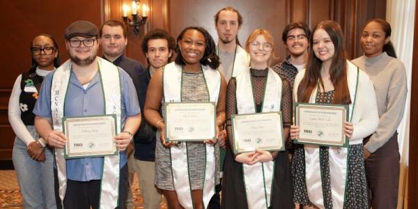 McNair scholars holding awards