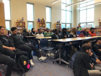 CMSD Newcomer Academy students listening to presentation