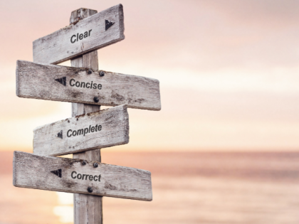 Image showing way-finding post with boards saying 'clear', 'concise', 'complete', and 'correct'